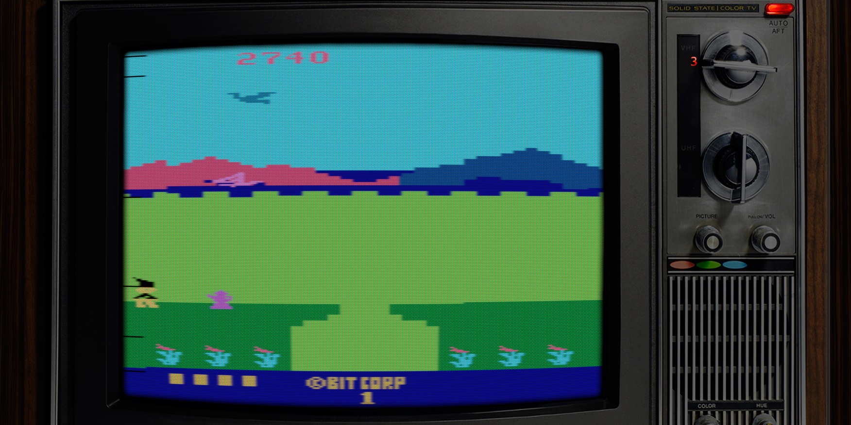 Vintage CRT television displaying a retro video game